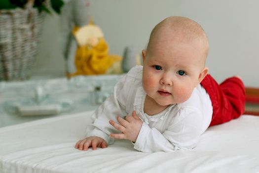 Toddler learns to crawl. High quality photo