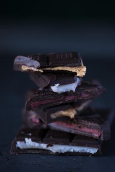 variety of homemade chocolate with different fillings.dark food photo