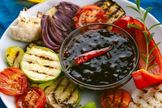 grilled vegetables with teriyaki sauce. High quality photo