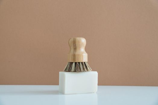 zero waste bamboo brush with soap for dishwashing . High quality photo