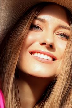 Fashion, travel and beauty face portrait of young woman, happy smiling model wearing beach sun hat in summer, head accessory and style concept