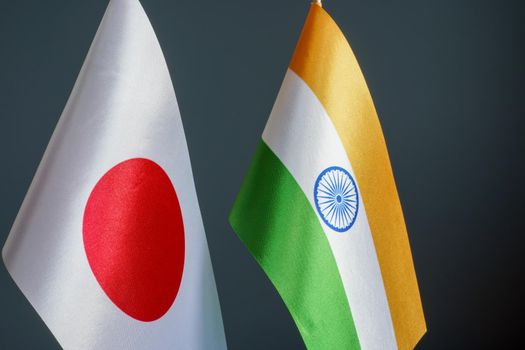 Small flags of Japan and India. Diplomatic relations concept.