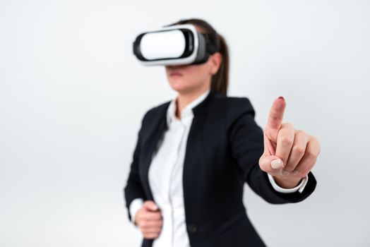 Woman Wearing Vr Glasses And Pointing On Important Message With One Finger.