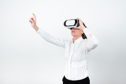 Woman Wearing Vr Glasses And Pointing On Important Message With One Finger.