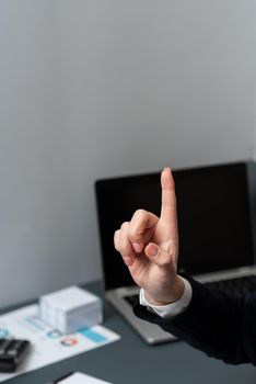 Businesswoman Pointing Important Infortmations With One Finger.