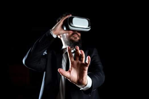 Businessman Gesturing While Experiencing Virtual Reality Simulator.