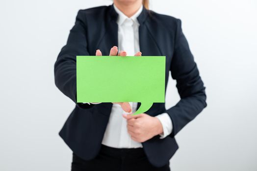 Businesswoman Holding Speech Bubble With Important Messages.