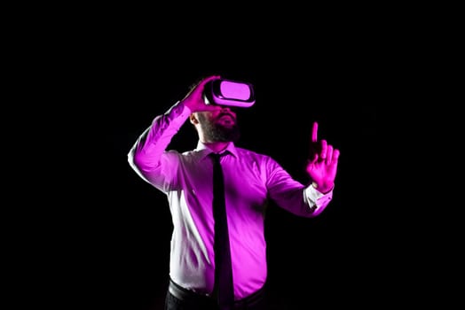 Businessman Wearing Headset And Enjoying Virtual Reality Simulator.