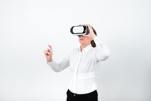 Woman Wearing Vr Glasses And Pointing On Important Message With One Finger.