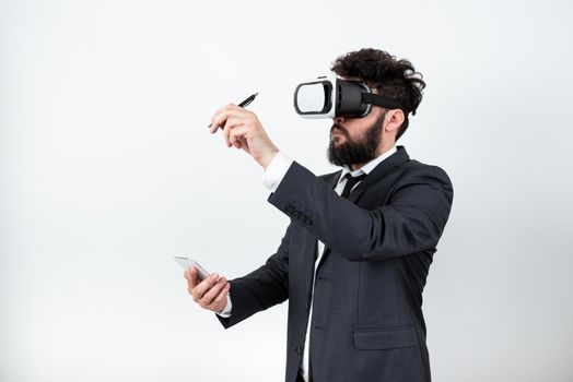 Man Holding Mobile Phone, Wearing Vr Glasses And Pointing On New Idea.