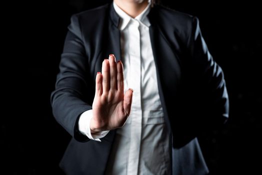 Businesswoman Presenting Important Information Next To Hand.