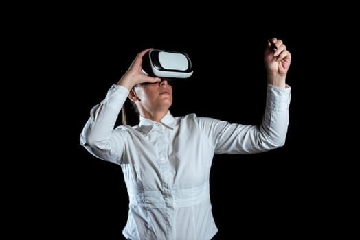 Woman Wearing Virtual Reality Simulator And Presenting Modern Technology.