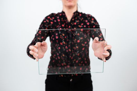 Businesswoman Holding Glass Banner For Promoting The Company.