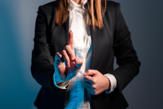 Businesswoman Pointing Important Infortmations With One Finger.