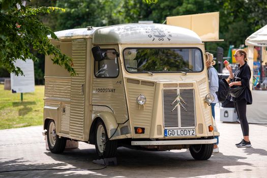 Gdynia, Poland - July 2022: Citroen H Catering vintage van sells ice cream on the waterfront in Gdynia. landmark in the popular coastal resort of Poland