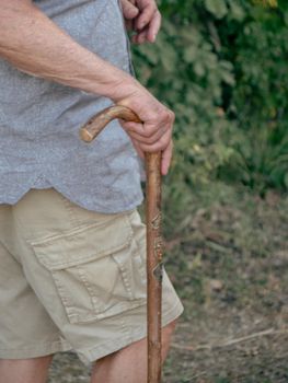 close up of wrinkled male old man on a sky pole