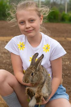 Rabbit summer day little outdoor girl white playing child easter, from smile cute for spring and hunt garden, love hand. Beautiful nose rural,