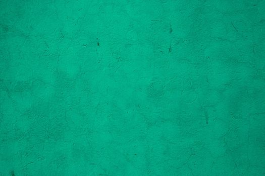 Abstract background of old blue green plaster.