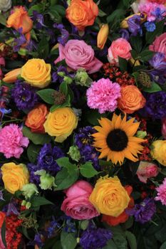 Mixed colorful flowers in a floral wedding decoration