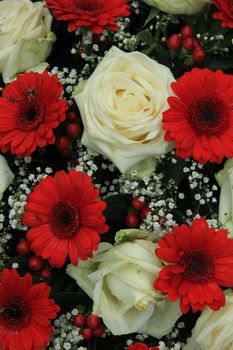 Bridal bouquet in red and white: gerberas, roses and gypsophila