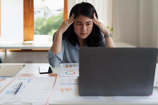 Image of Young woman stressed while reading a book for exam at library at school. back to school concept