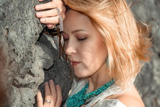 fashionable young model in boho style dress