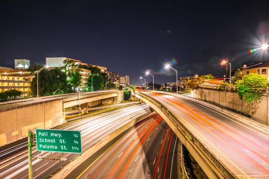 evening commute on H1 Freeway at night in honolulu hawaii