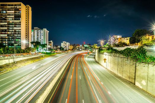 evening commute on H1 Freeway at night in honolulu hawaii