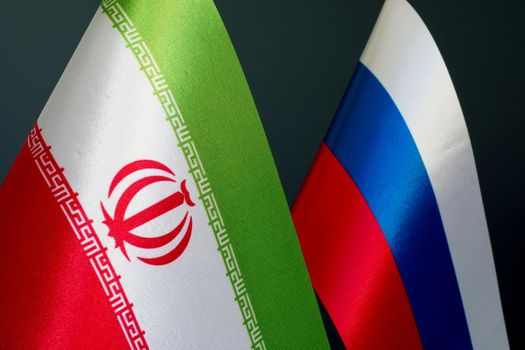 Flags of Iran and Russia as symbol of diplomatic relations.