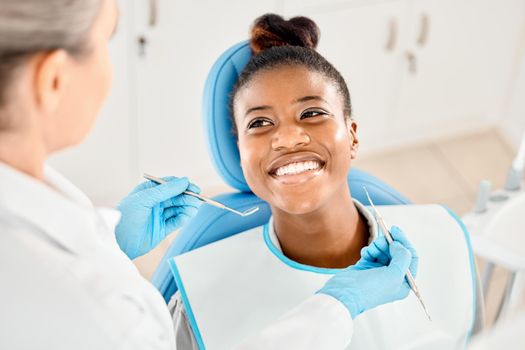 Youve really been caring for your teeth. a young woman at her dental checkup