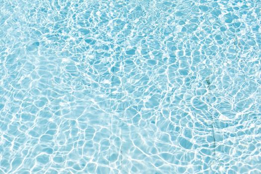 surface of blue swimming pool, background of water in swimming pool