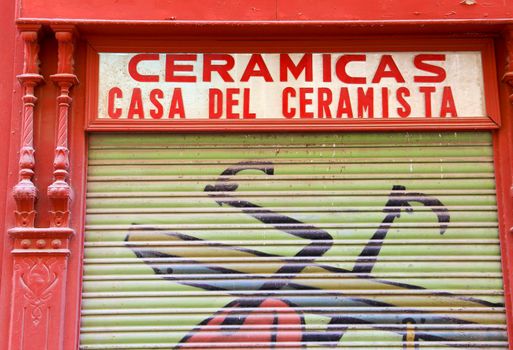 Cartagena, Murcia, Spain- July 18, 2022: Old ceramic business closed to the public due to the crisis