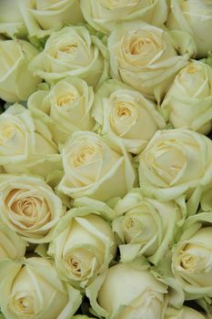 Classic white wedding arrangement with big white roses