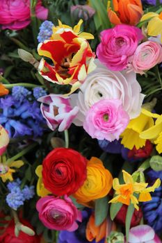 Colorful mixed bouquet with various spring flowers