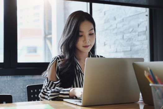 freelance concept,female using computers to design work as ordered by customers