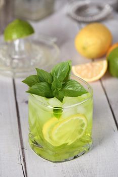 Thai basil smash cocktail   and lemon. Refreshing organic gin drink.