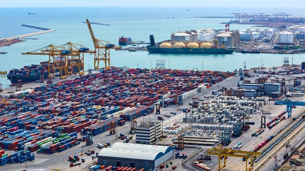 Barcelona, Spain - April 8, 2019: Industrial Port for freight transport and global business. Gas tanker on loading