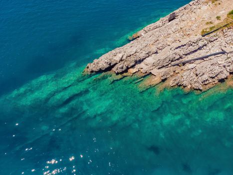 The pipe drains the sewer into the sea. Environmental pollution. Drone view.