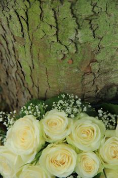 Outdoor flower decorations with white roses and gypsophila