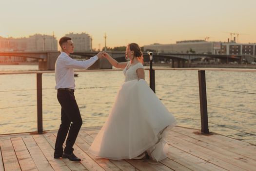 The dance of the bride and groom. Wedding article. A happy couple. Love. Photos for printed products. Romance