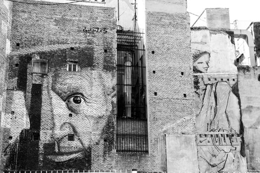 Cartagena, Murcia, Spain- July 18, 2022: Beautiful paintings on the wall of old buildings in Cartagena