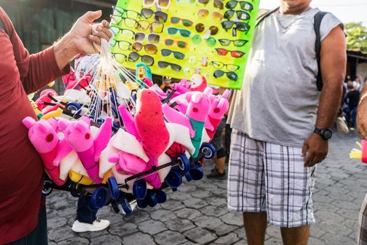 Sellers of glasses and cheap toys in the streets of Managua, Nicargua, Self-employed workers