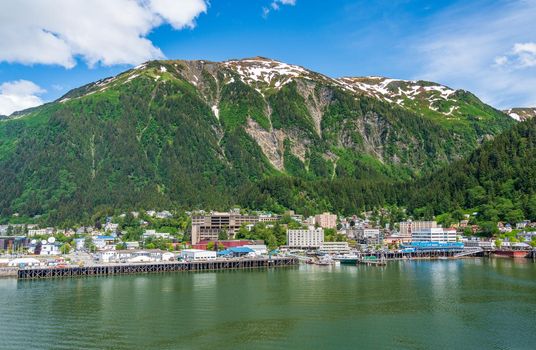 Juneau, AK - 9 June 2022: View of the port of Juneau in Alaska from the water of the harbor