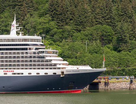 Juneau, AK - 9 June 2022: View of the the Cunard ocean liner Queen Elizabeth docked in Juneau Alaska