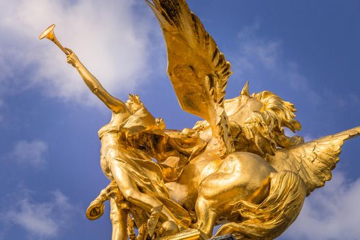Golden fame Sculpture in Pont Alexandre III, Paris, france