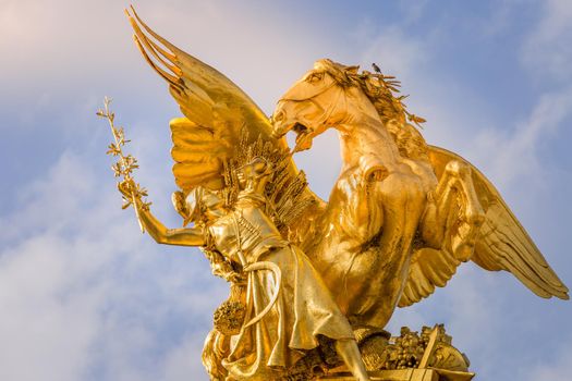 Golden fame Sculpture in Pont Alexandre III at sunny day, Paris, france