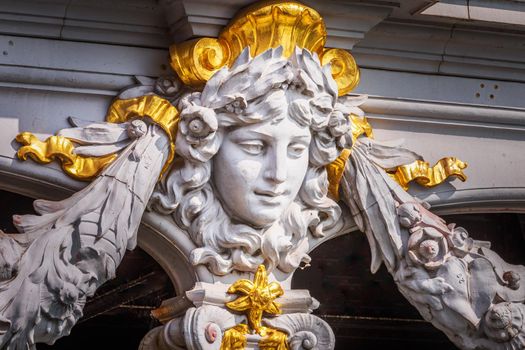 Close-up of ornate golden statue in Pont Alexandre III, Paris, france