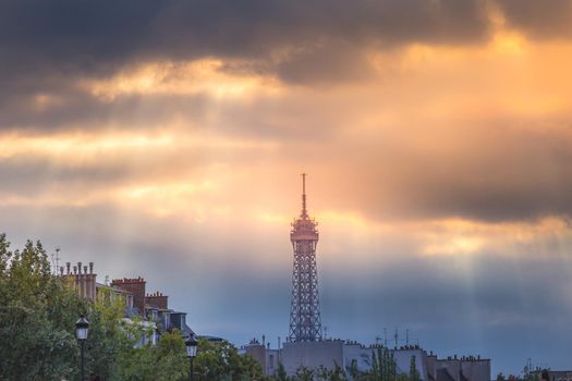 Eiffel tower view from trocadero with sunrays and clouds, Paris, France