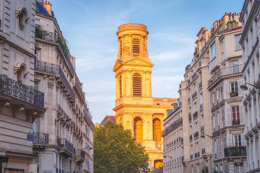 Church of Saint-Sulpice at golden sunset in Quarter Latin, Paris, France