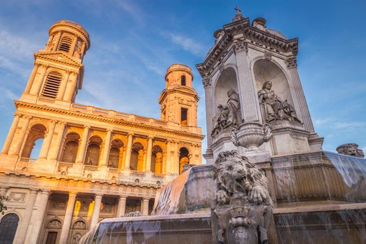 Church of Saint-Sulpice and fountain at golden sunset, Paris, France